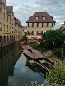 Folklore dancing in the evening at Colmar, Alsace (France)